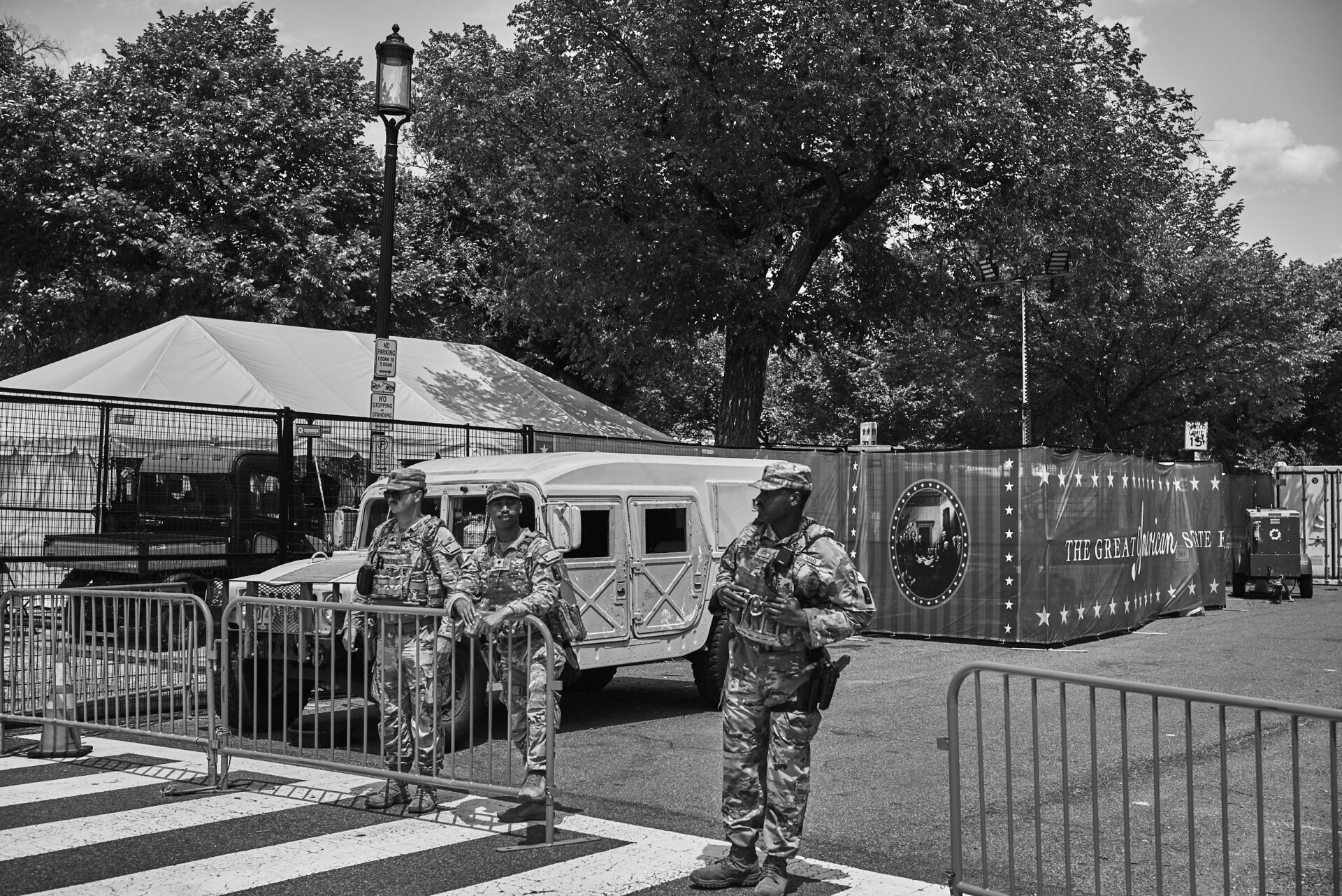 National guard standing around by a humvee at the Great American State Fair