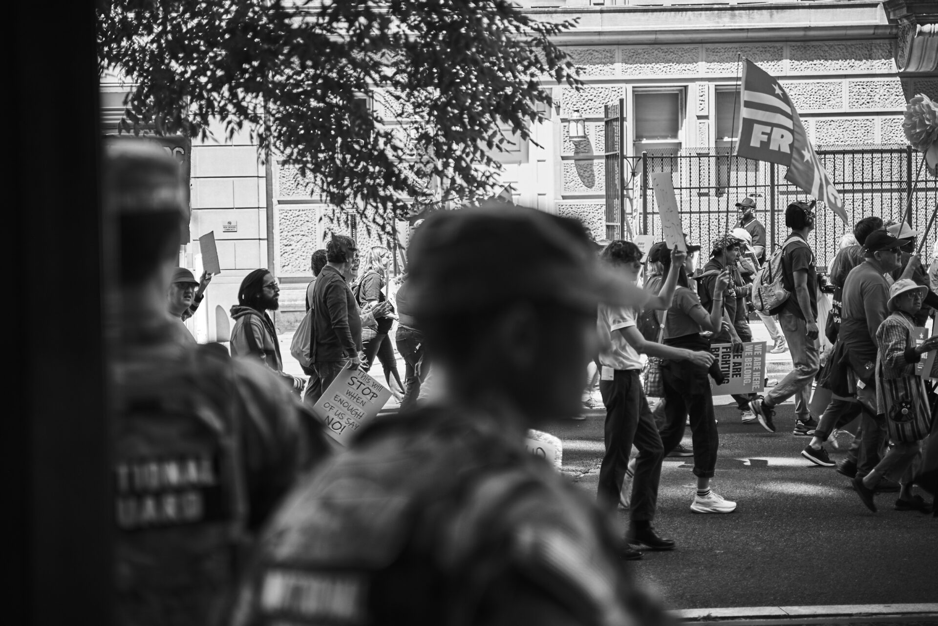 The national guard watches protestors